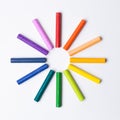 Oil Pastel Crayons on White background. Color Wheel Colors Royalty Free Stock Photo