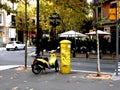 Oil pastel style sketch drawing of yellow scooter and terrace on a Barcelona street corner Royalty Free Stock Photo