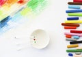 Oil pastels crayons colorful art drawing and cotton bud on white