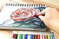 Oil pastels crayons colorful picking art drawing on wood table. Royalty Free Stock Photo