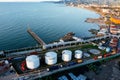 Oil or petroleum storage tanks in seaport, aerial drone view Royalty Free Stock Photo