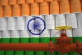 Oil pipe and barrels with painted flag of India. Petroleum industry related 3d rendering