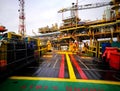 Oil platform crew stand by on deck for crew transfer Royalty Free Stock Photo