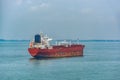 Oil product tanker in ballast anchored in outer harbor in front of the Pengerang Deepwater Petroleum Terminal. Johor, Malaysya