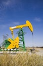 Oil pump jack Royalty Free Stock Photo