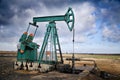 Oil pump jack Royalty Free Stock Photo