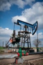 Oil pump jack Royalty Free Stock Photo