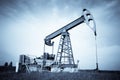 An oil pump jack Royalty Free Stock Photo