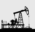 Oil pump silhouette over grey background.