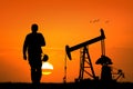 Oil pump silhouette at sunset