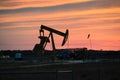 Oil Pump at Sunset in the Eagle Ford Basin Royalty Free Stock Photo