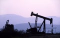 Oil Pumpjack at Sunset Royalty Free Stock Photo