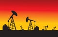 Oil pumps in sunset vector illustration