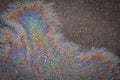 Oil rainbow gasoline spill on asphalt Royalty Free Stock Photo