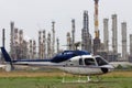 Oil refineries & helicopter Royalty Free Stock Photo
