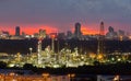 Oil refinery with city downtown background night view Royalty Free Stock Photo