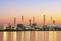 Oil refinery industry with twilight sky after sunset at Chaopraya river, Bangkok, Thailand. Royalty Free Stock Photo