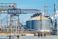 Oil refinery industry view details of pipes with valves in a large refinery isolated on blue sky Royalty Free Stock Photo