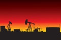 Oil refinery and oil pumps silhouettes in sunset