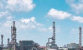 Oil refinery or petroleum refinery plant with blue sky background. Power and energy industry. Oil and gas production plant. Royalty Free Stock Photo