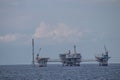 Oil refinery platform at the open sea, producing black gold