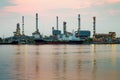 Oil refinery river front with reflection Royalty Free Stock Photo