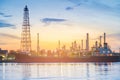 Oil refinery river front with sunset sky Royalty Free Stock Photo