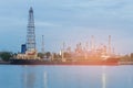 Oil refinery river front and tank boat