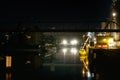 Oil refinery with water vapor in Mannheim, Germany, petrochemical industry night scene