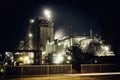 Oil refinery with water vapor in Mannheim, Germany, europe petrochemical industry night scene scrap metal vintage