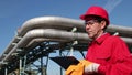 Oil Refinery Worker in Red Overalls