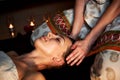 Oil relaxing head massage. Relaxation and Royalty Free Stock Photo