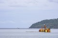Oil rig and island in the sea coastline at Laem thian beach , Chumphon in Thailand