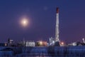 Oilfield in winter night time