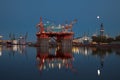 Oil rig at night Royalty Free Stock Photo