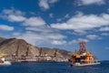 Oil rig platform at dawn in the port of Santa Cruz de Tenerife Canary Islands Spain. Anaga mountains in background Royalty Free Stock Photo