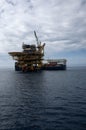 Oil rig platform with work barge at south china sea