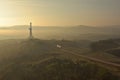 Oil rig at sunrise on a foggy morning Royalty Free Stock Photo