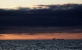 Oil rig and tanker at dusk in the north sea Royalty Free Stock Photo