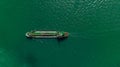 Oil Ship tanker or Liquid fied Petroleum Gas (LPG) sailing in green sea aerial top view Royalty Free Stock Photo