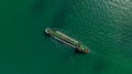Oil Ship tanker or Liquid fied Petroleum Gas (LPG) sailing in green sea aerial top view Royalty Free Stock Photo