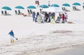 Oil spill workers cleaning beach