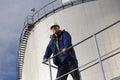 Oil storage and engineer Royalty Free Stock Photo