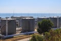 Oil storage reservoirs on the seashore in port