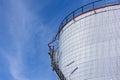 Oil storage tanks with blue sky background, Industrial tanks for petrol and oil, White fuel storage tank against blue sky Royalty Free Stock Photo