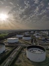 Oil storage tanks with sunset at oil refinery Royalty Free Stock Photo