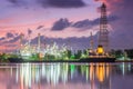 Oil tank ship mooring in oil refinery industry at twilight time