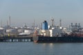 Oil tanker carrier unloading at a refinery