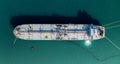 Oil tanker moored at sea, aerial top view. Global trading import and export logistic transportation Royalty Free Stock Photo