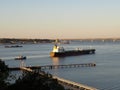 Oil Tanker Ship Being Guided in with Tug Boats